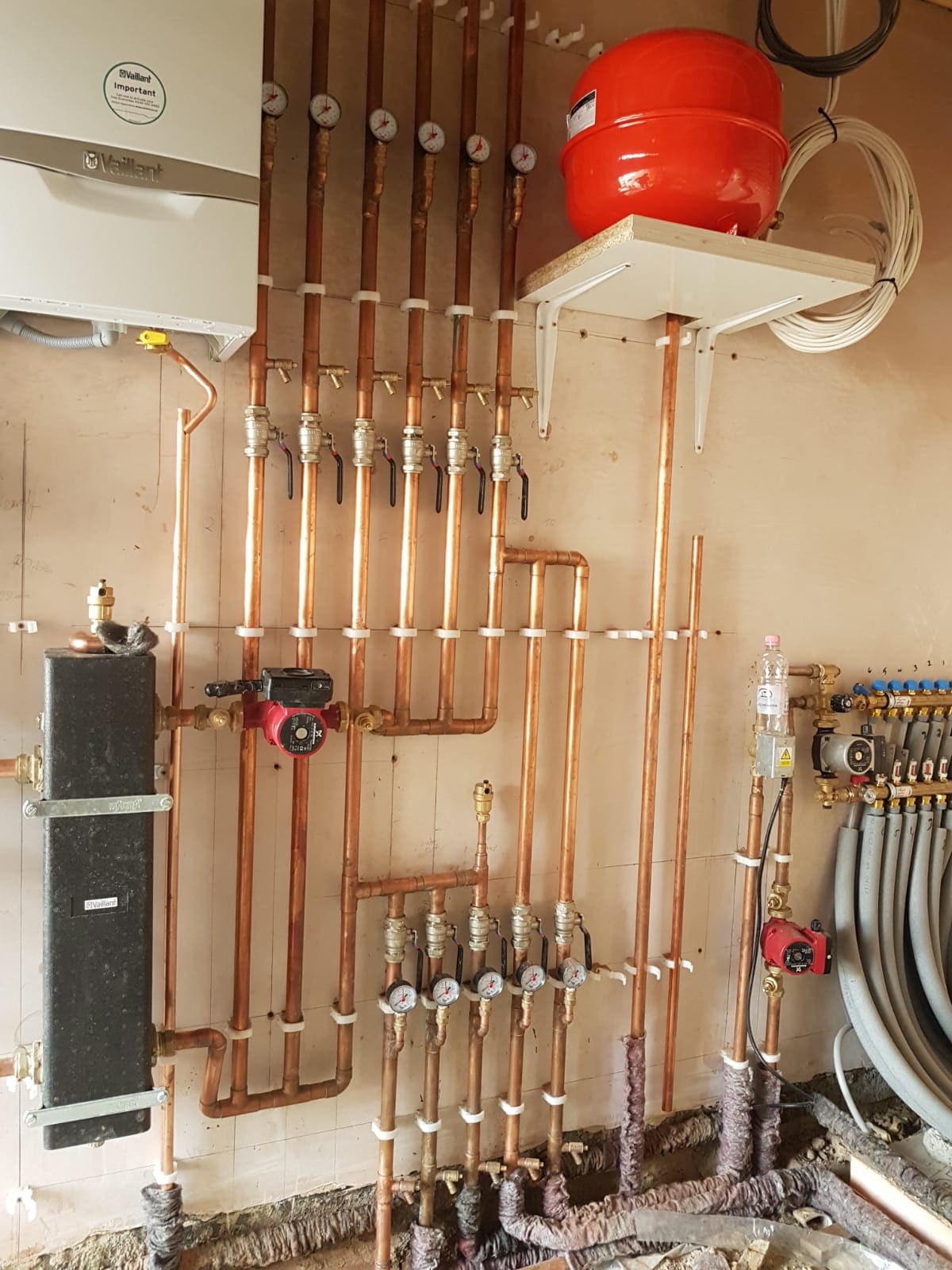 Vaillant boiler and copper pipework central heating installation in Hertfordshire